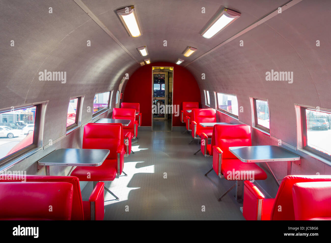 NORTH ISLAND, NEW ZEALAND- MAY 18, 2017: There are seats inside the plane, and it is 10 coolest McDonald's around the world, DC3 plane as part of the  Stock Photo
