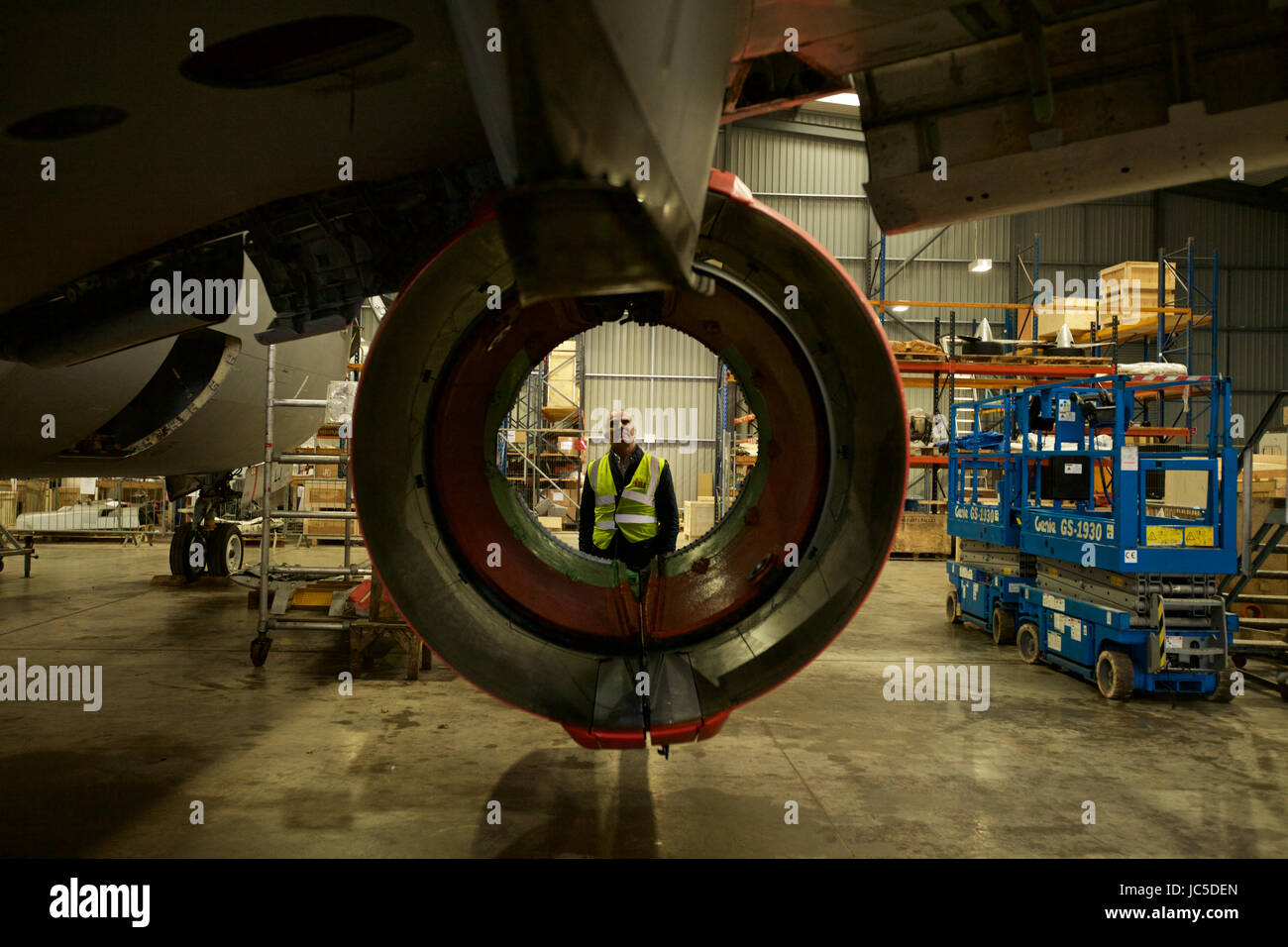Where passenger aircraft go to die. Mark Gregory, CEO of Air Salvage International looks through an engine casing on a retired airliner Stock Photo
