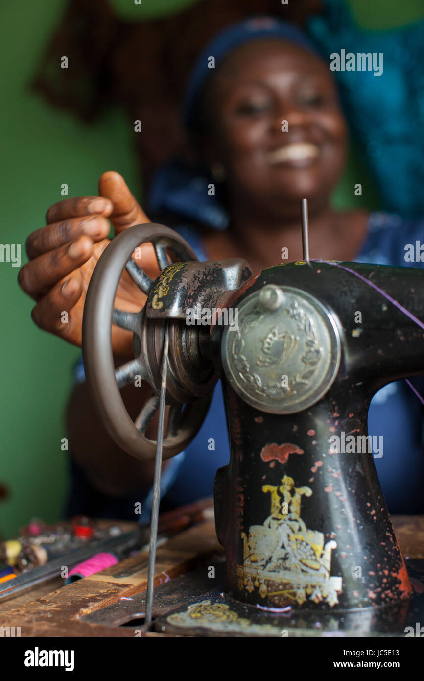 A female tailor at her sewing machine, Nigeria, Africa Stock Photo Alamy