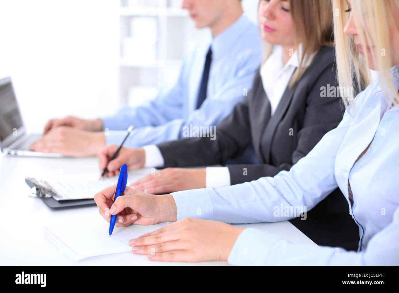Group of business people working together in office Stock Photo - Alamy