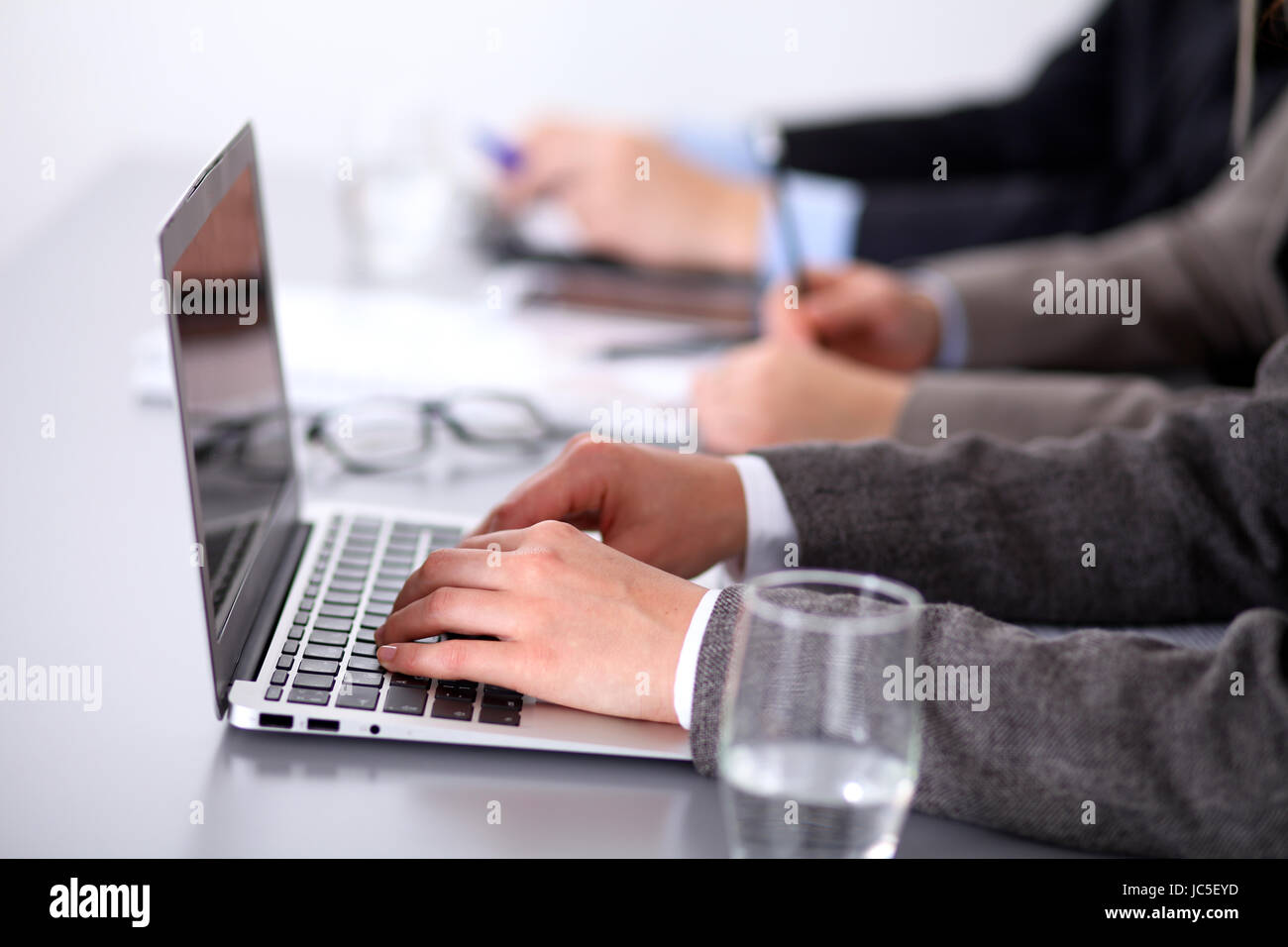 Group of business people working together in office Stock Photo - Alamy