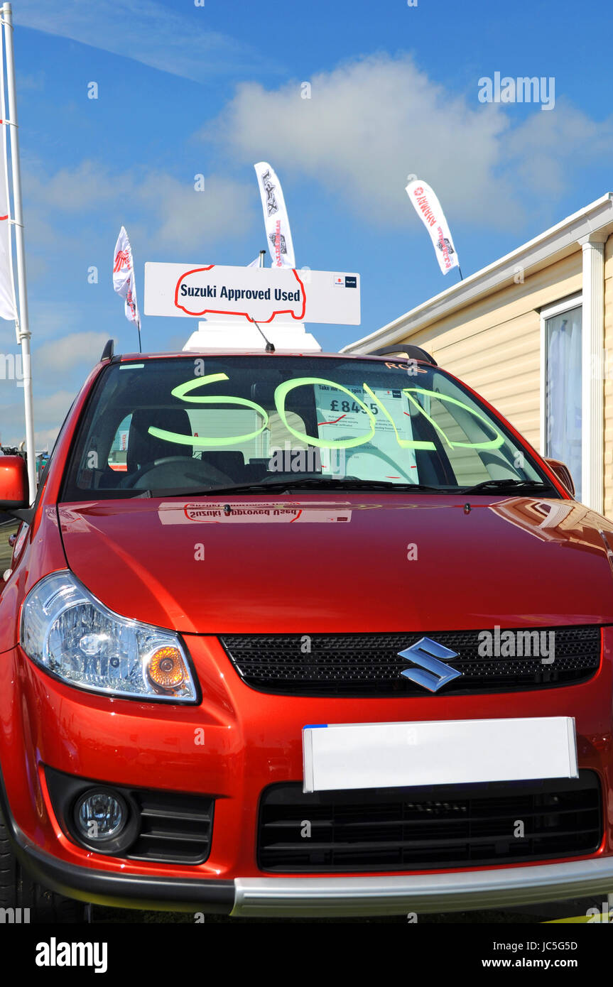 used car sold sign second hand car sales Stock Photo