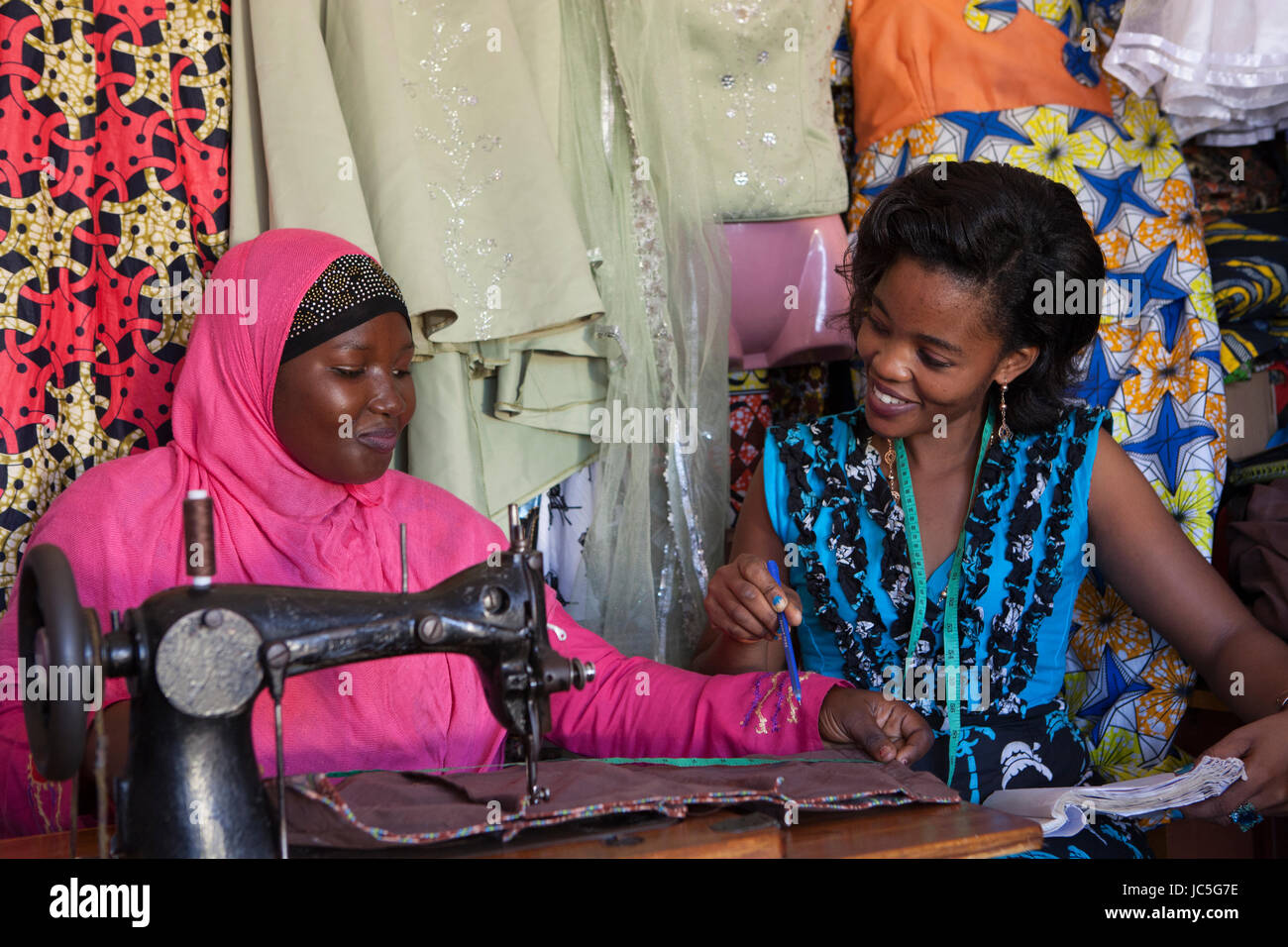 Female tailor in her shop, Tanzania, Africa Stock Photo