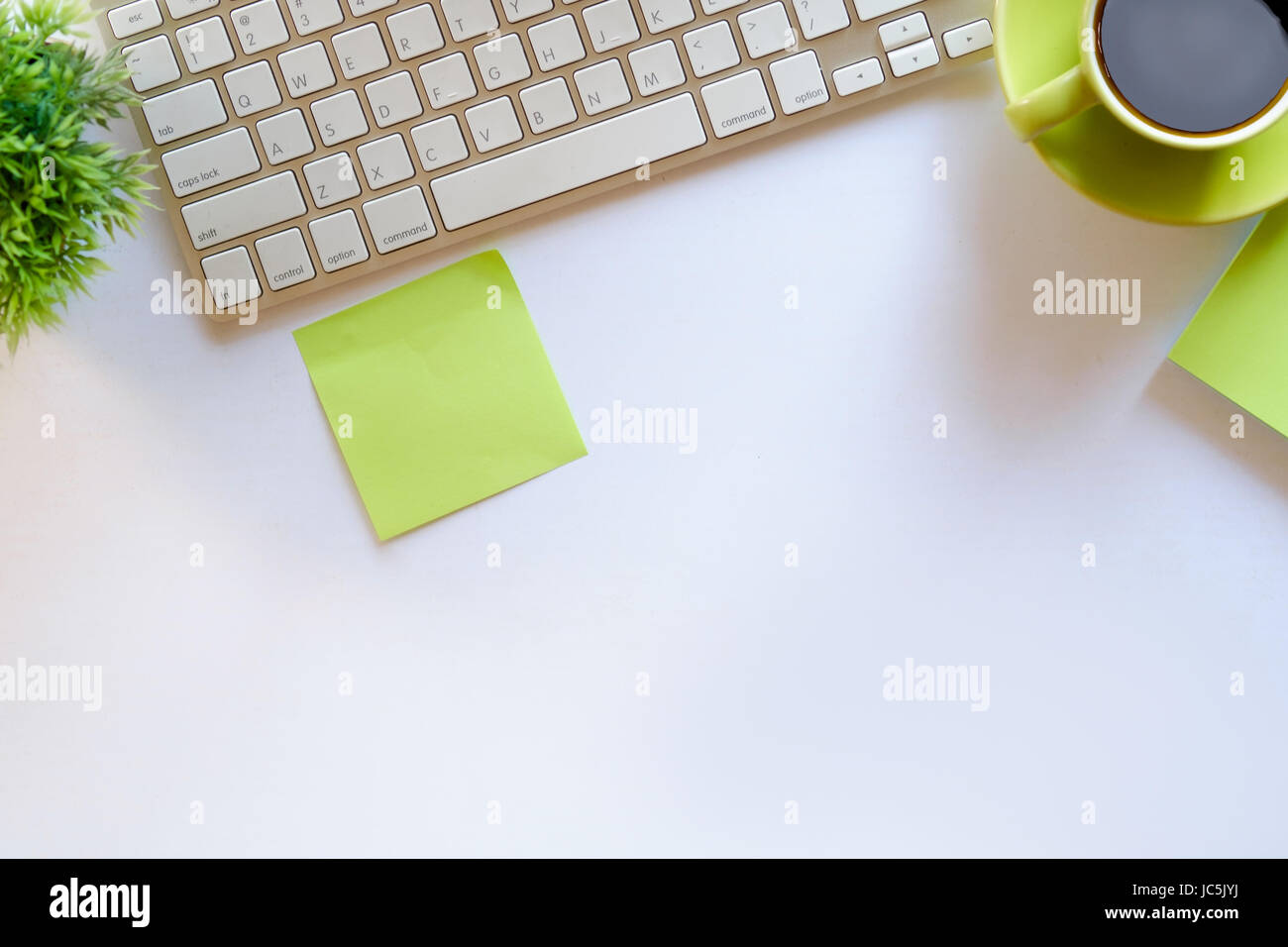 Coffee and white desk table with copy space Stock Photo - Alamy