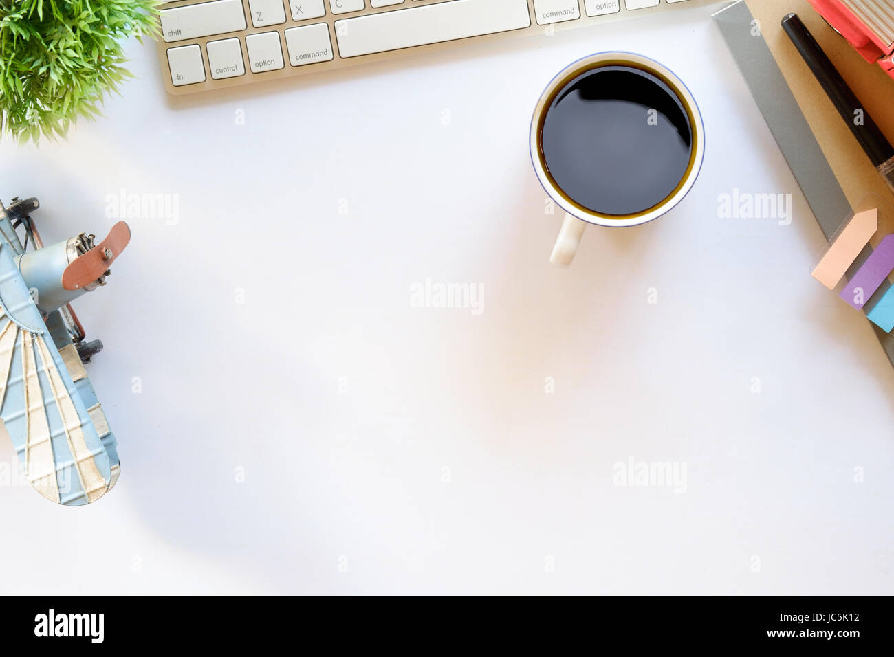 Coffee and white desk table with copy space Stock Photo - Alamy