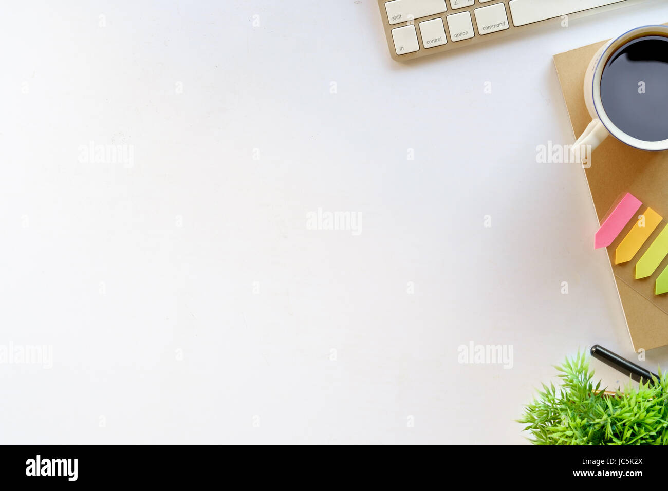 Coffee and white desk table with copy space Stock Photo - Alamy