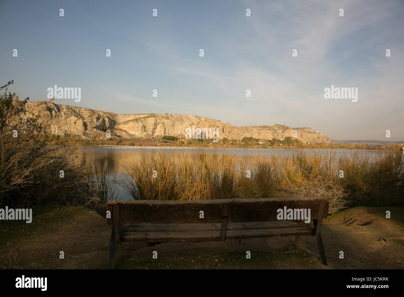 Picture of a lake with reflection of the sky and trees Stock Photo - Alamy