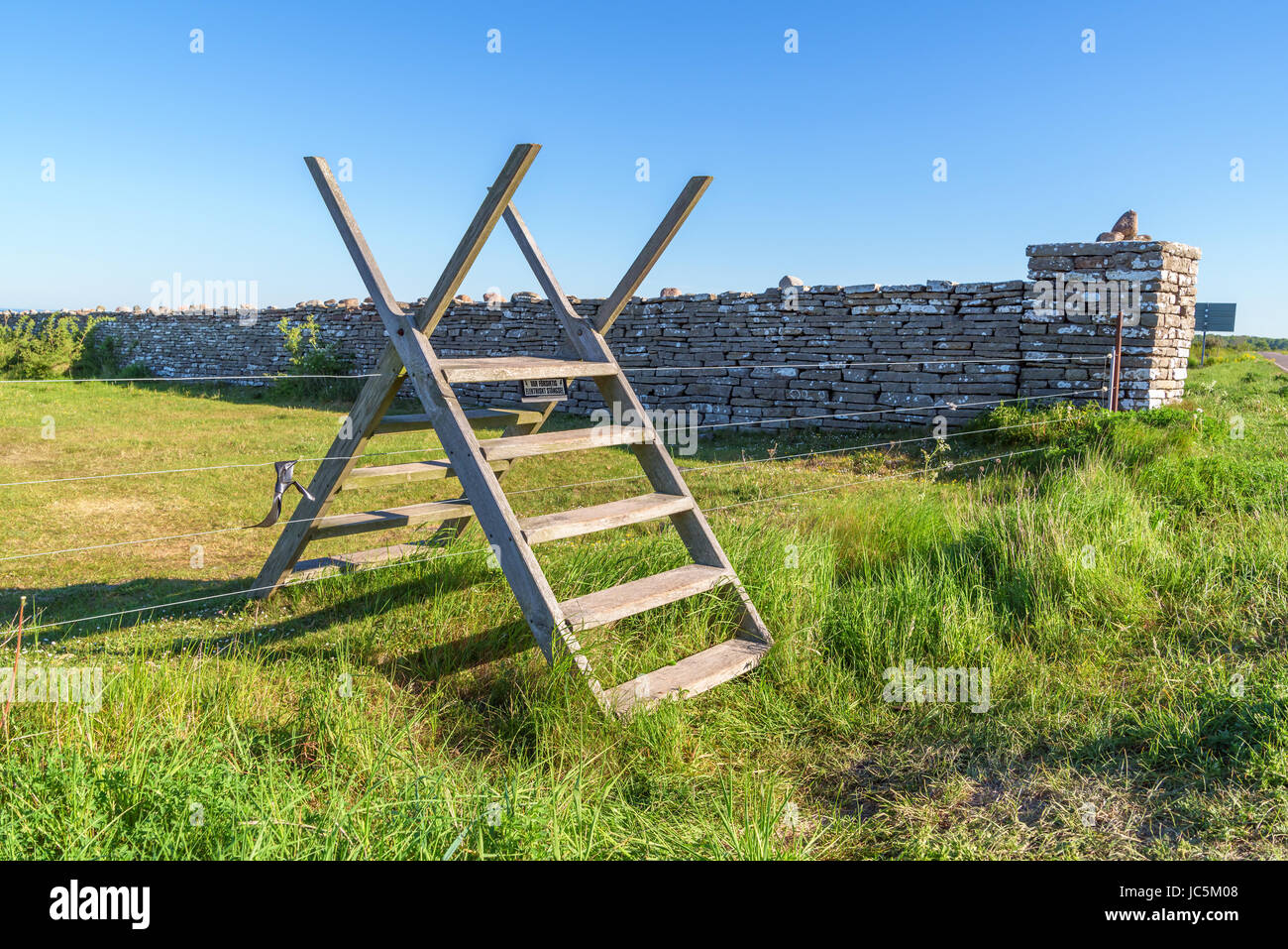 Ladder over fence hires stock photography and images Alamy
