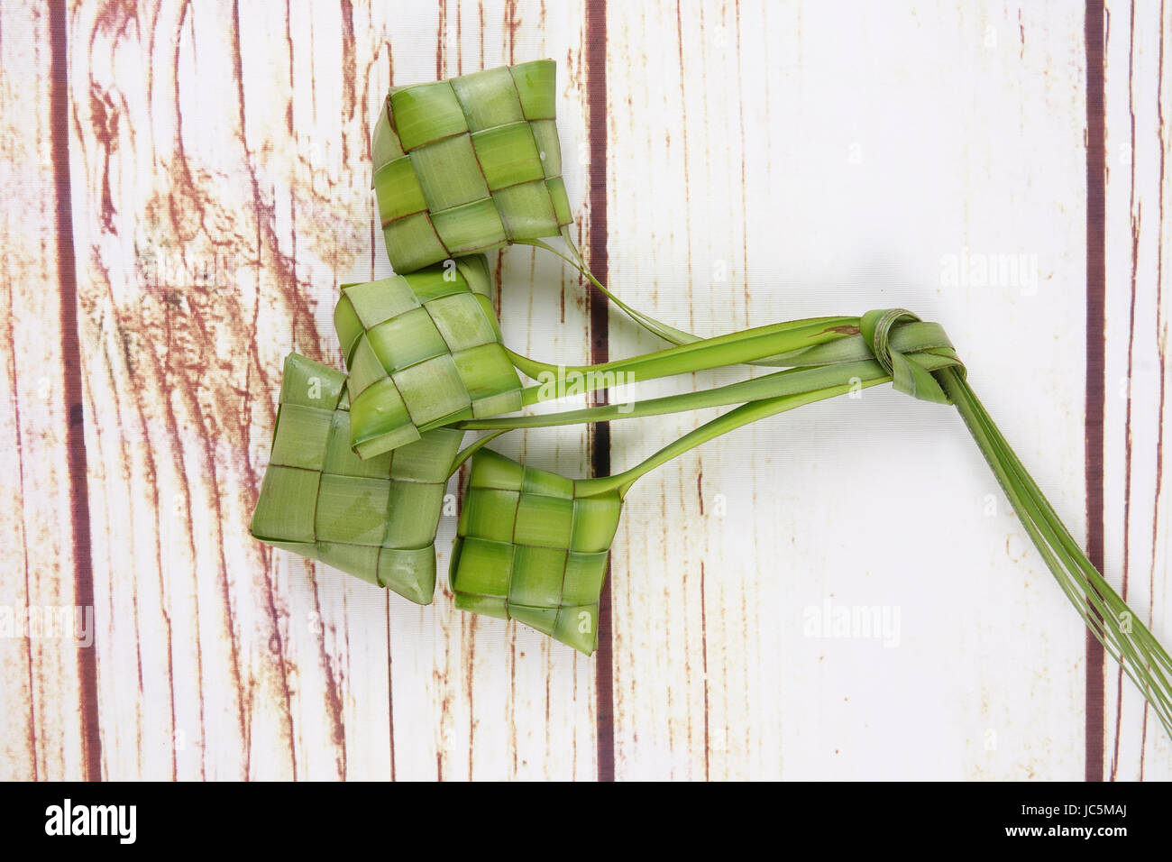 Making ketupat natural rice hi-res stock photography and images - Alamy