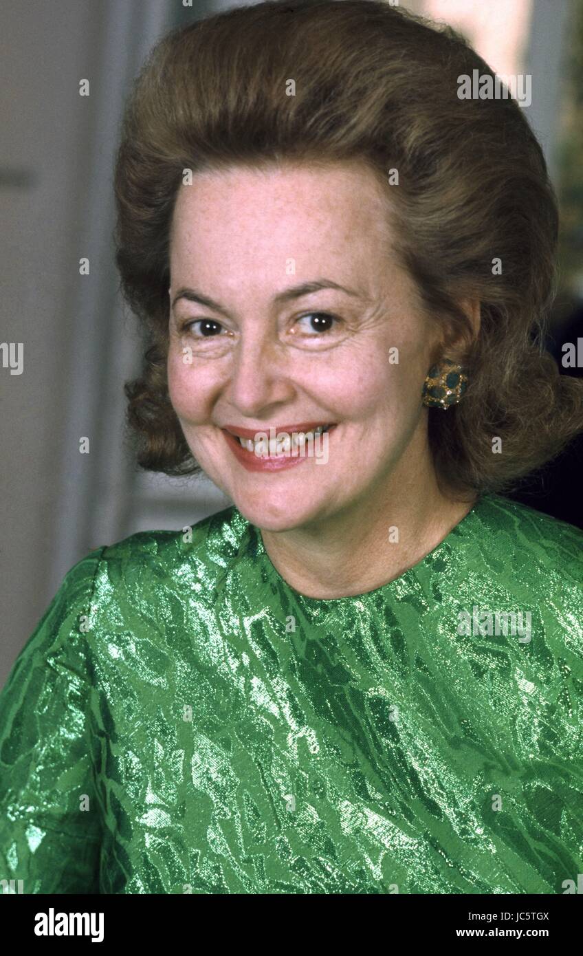 American actress Olivia de Havilland posing in her Paris apartment