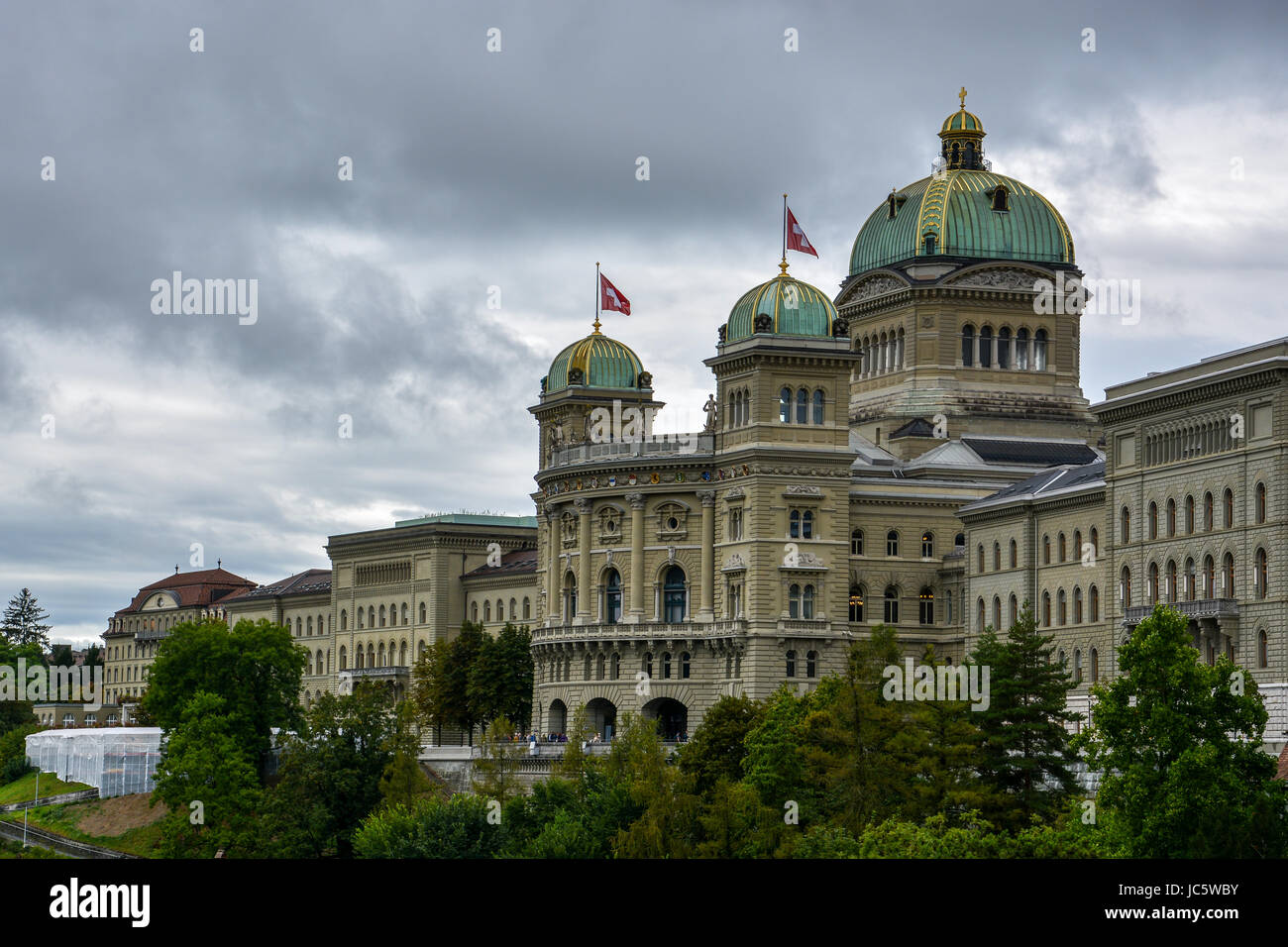 The impressive 'Bundeshaus' in Bern, Switzerland with a cloudy sky Stock Photo