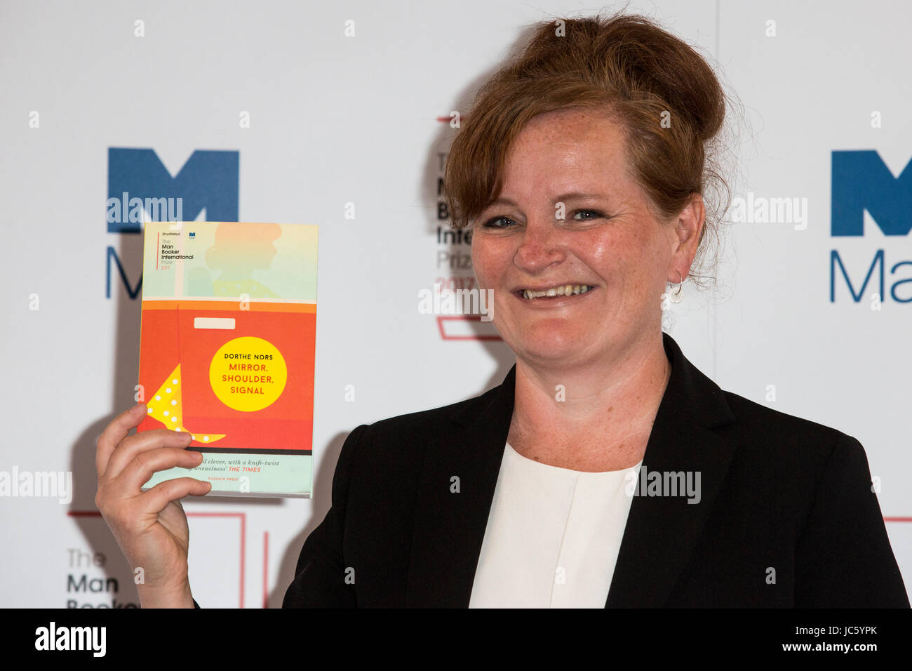 London, UK. 13 June 2017. Danish writer Dorthe Nors with her novel Mirror, Shoulder, Signal. Photocall with the shortlisted writers and their translators for the 2017  Man Booker International Prize. Stock Photo
