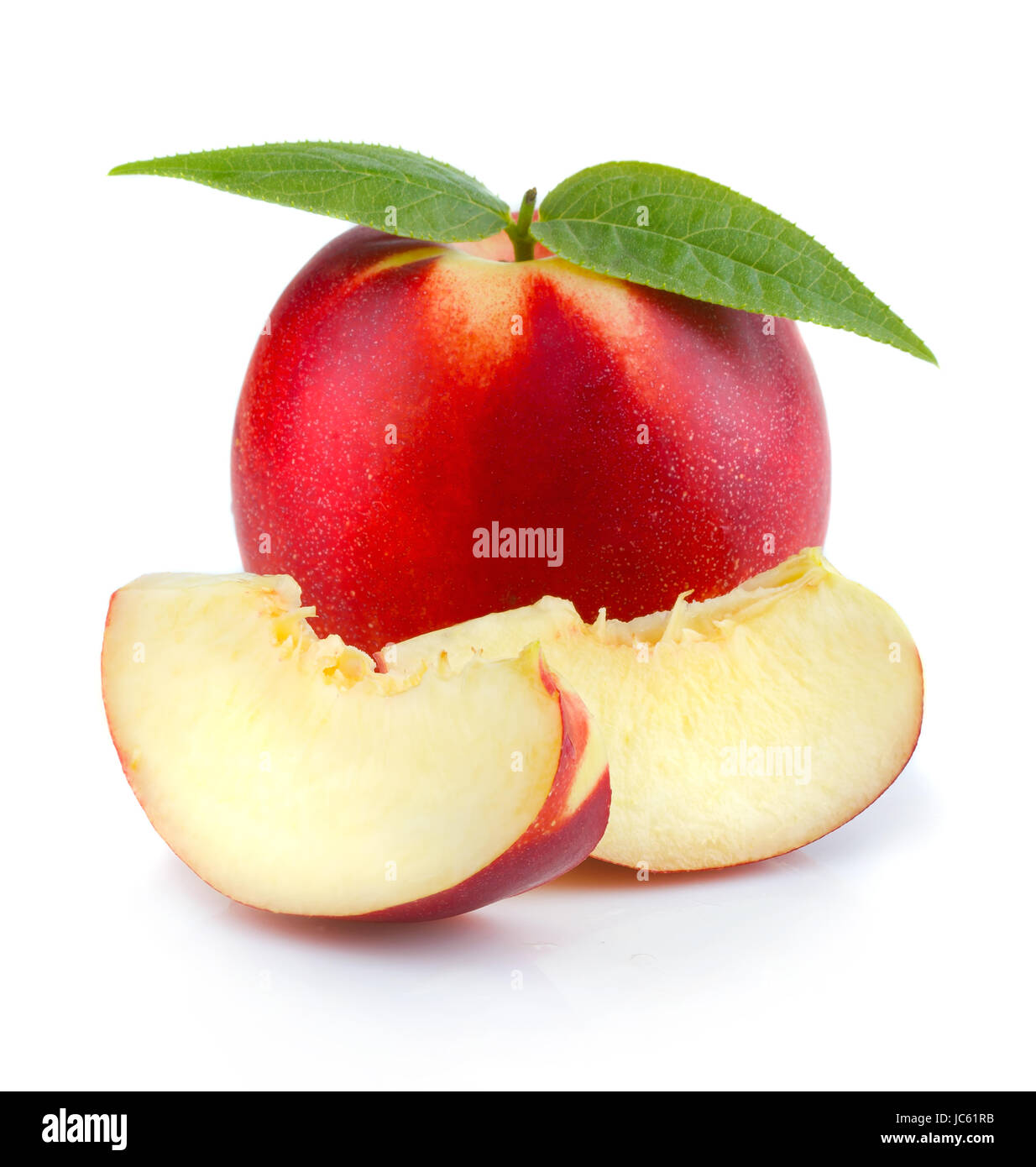 Ripe peach (nectarine) fruit with slices isolated on white background Stock Photo