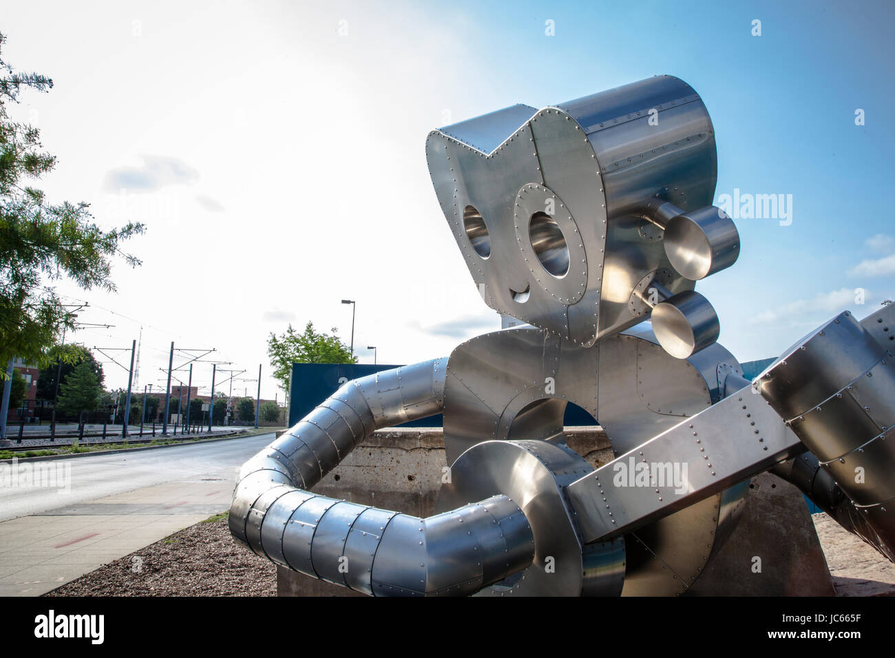 Metal sculpture 'Traveling Man', in the Deep Ellum neighborhood of Dallas, Texas Stock Photo