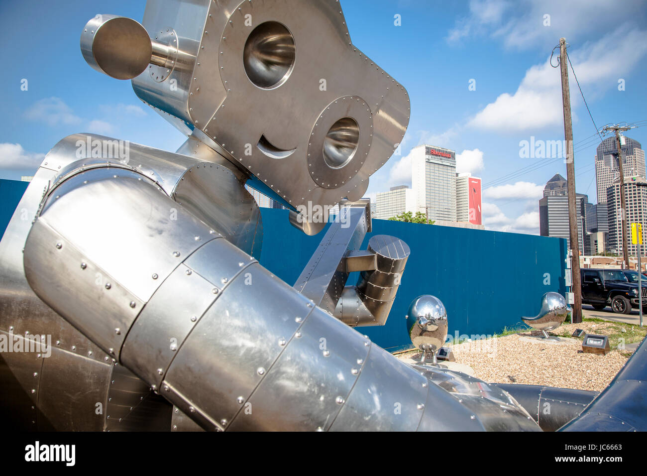 Metal sculpture "Traveling Man", in the Deep Ellum neighborhood of Dallas, Texas Stock Photo Alamy