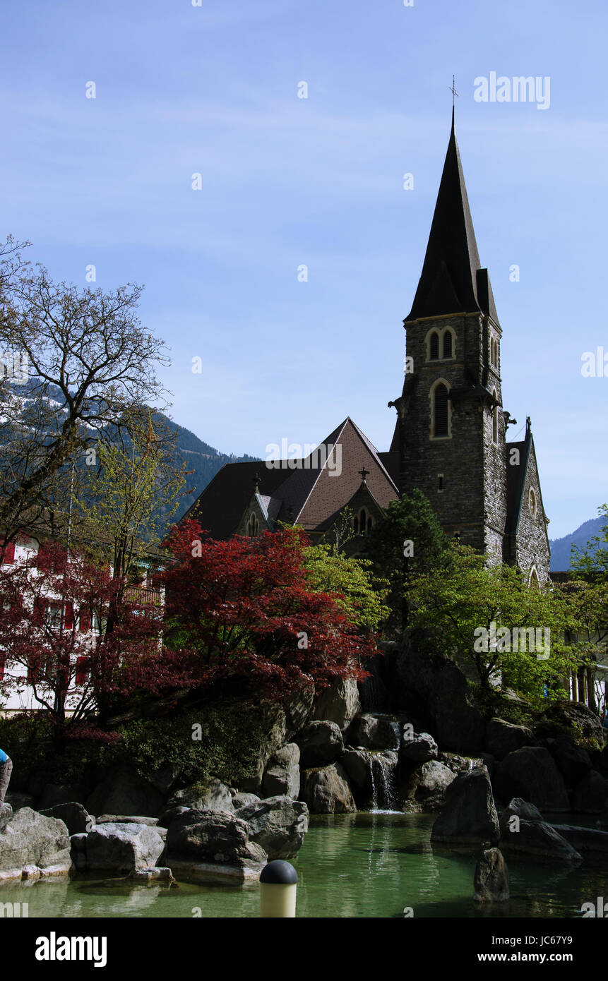Iconic church with garden in Switzerland Stock Photo Alamy