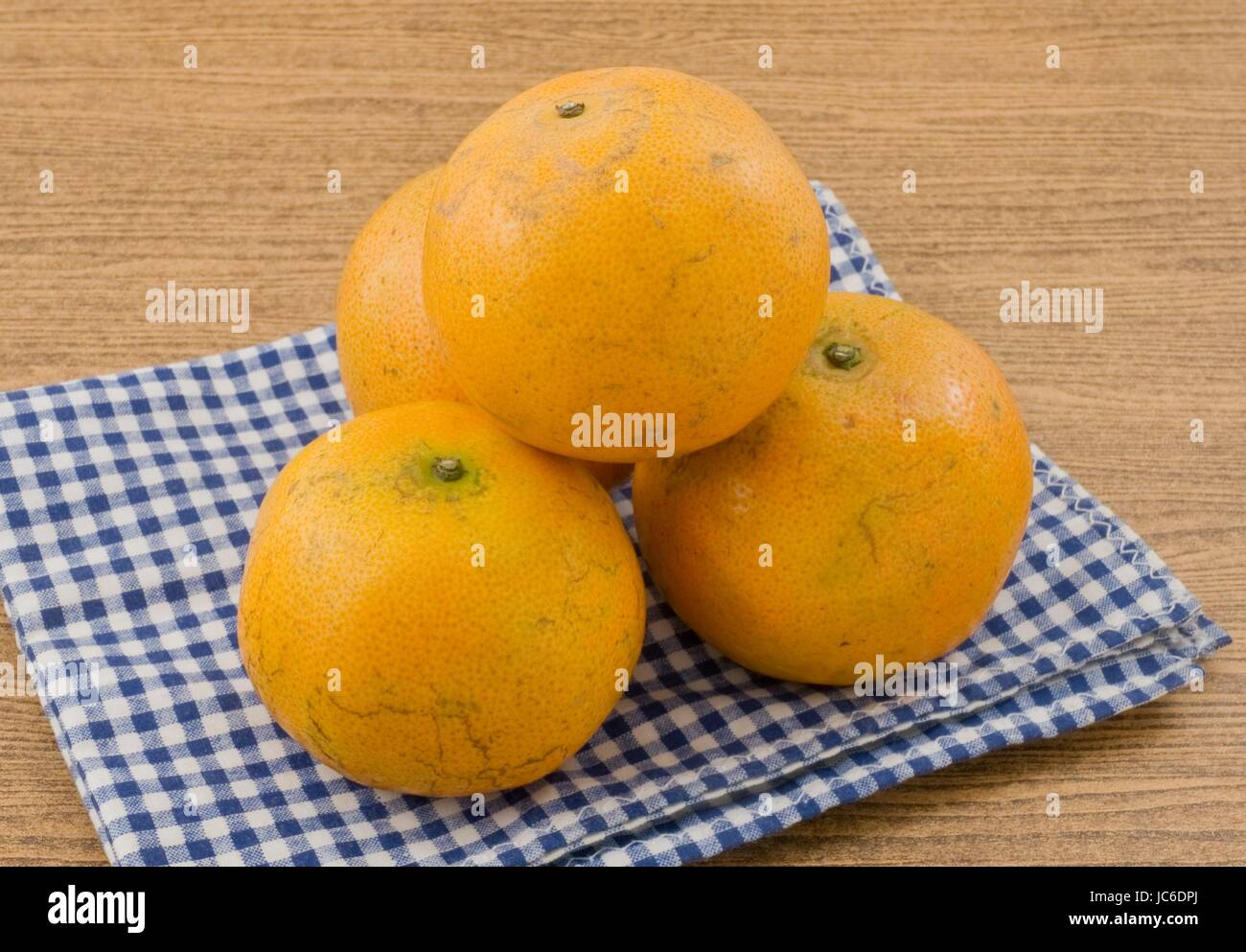 Fresh Ripe and Sweet Oranges on A Wooden Table, Orange Is The Fruit of The Citrus Species. Stock Photo