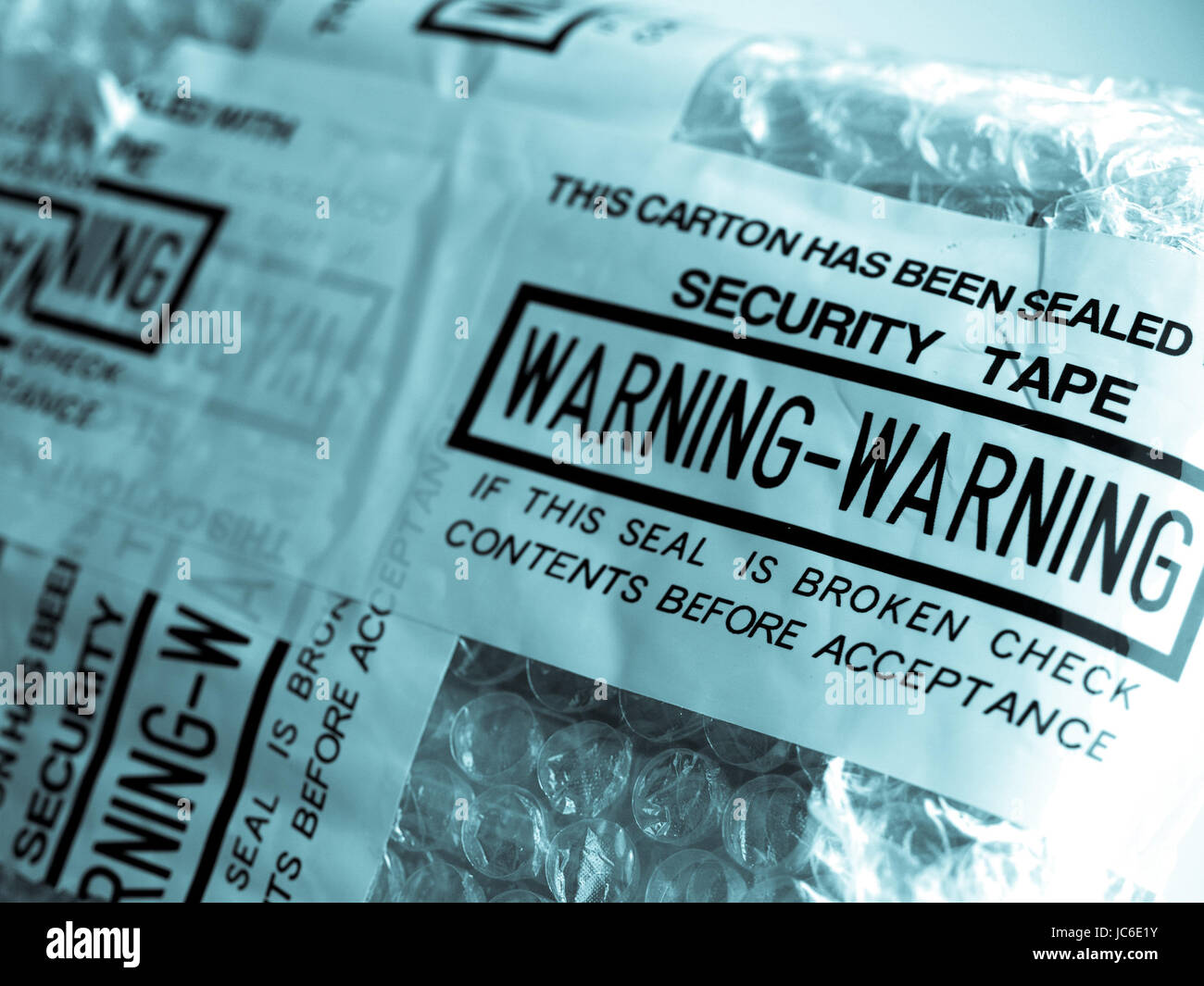 Warning packet sealed with security tape seal cool cyanotype Stock