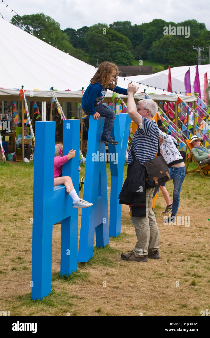 Children playing on Hay 30 sign at Hay Festival 2017 Hay-on-Wye Powys Wales UK Stock Photo