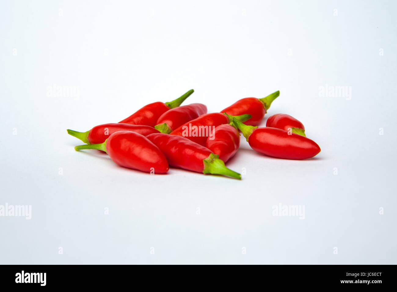 red chili pepper isolated on a white background Stock Photo - Alamy