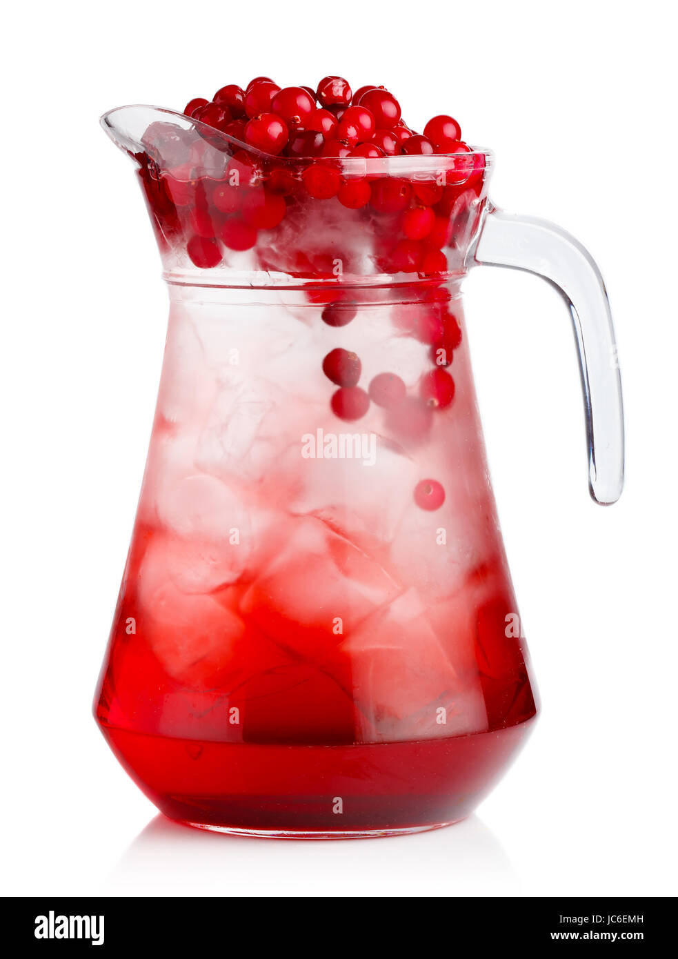 Full jug of fresh cranberries nonalcoholic cocktail with berries isolated Stock Photo