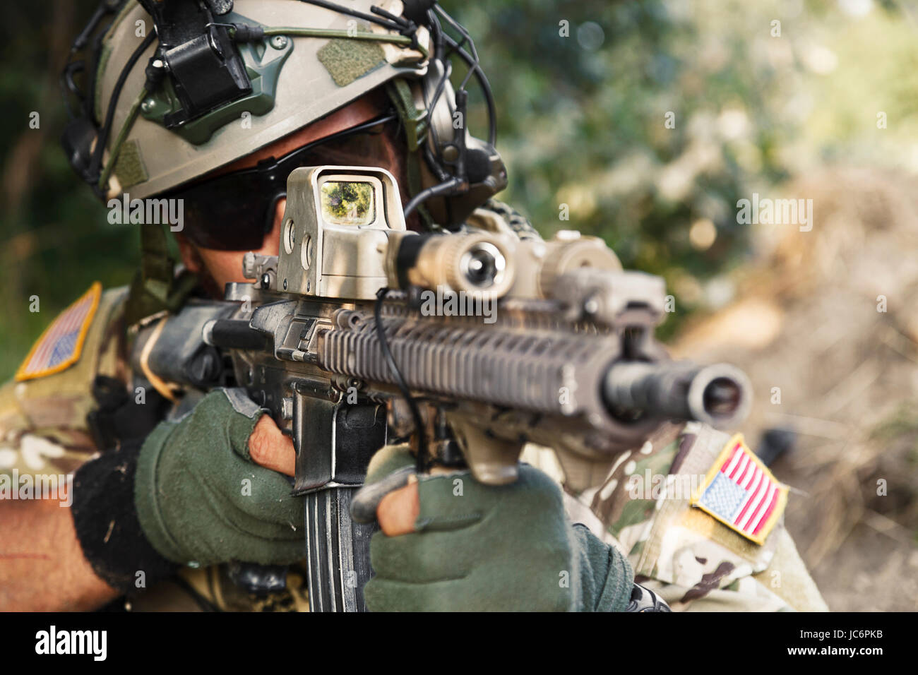 american soldier pointing hi rifle during the military operation Stock ...