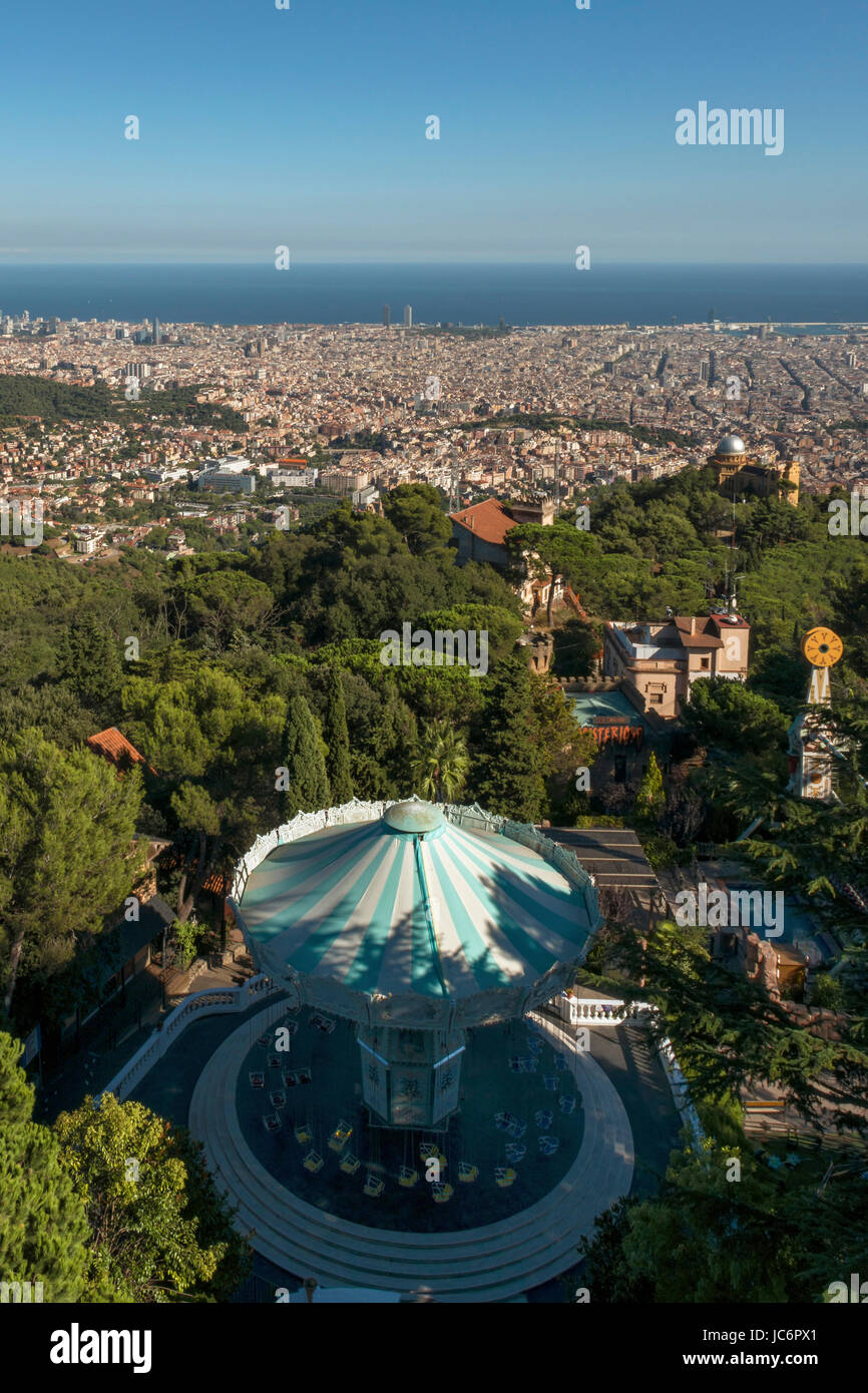 Cityscape of Barcelona seen from Tibidabo, Spain's longest running amusement park and Europe's third-oldest. Stock Photo