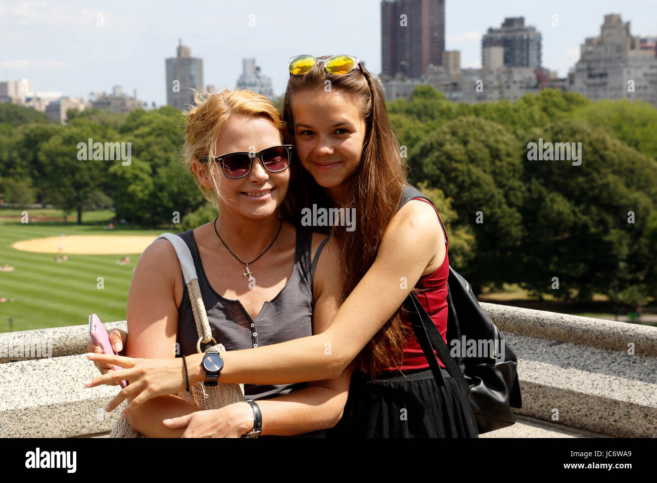 Tourists. Mather and Daughter. Central Park. Manhattan. New York City. US 17, 18, 19, 20, 21, 25, 40, 44, 45, 49, 50, 54, years, years old Stock Photo