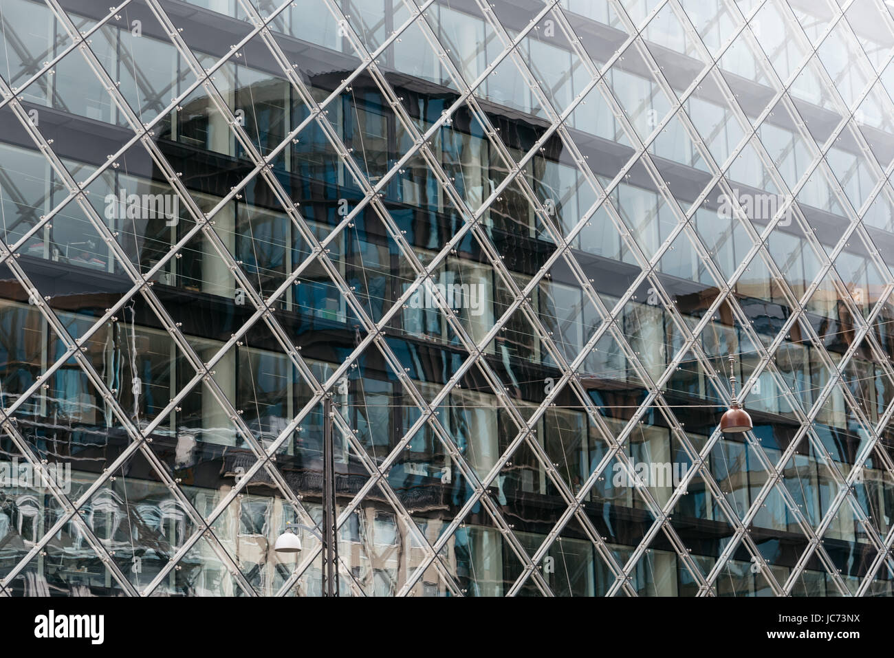 Reflection on modern office building glass facade Stock Photo - Alamy