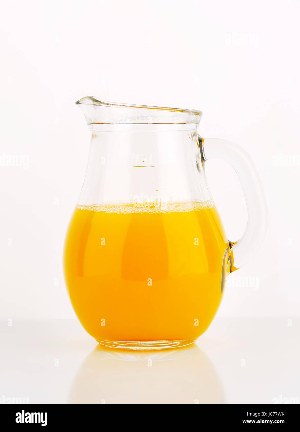 Fresh orange juice in a glass jug Stock Photo Alamy