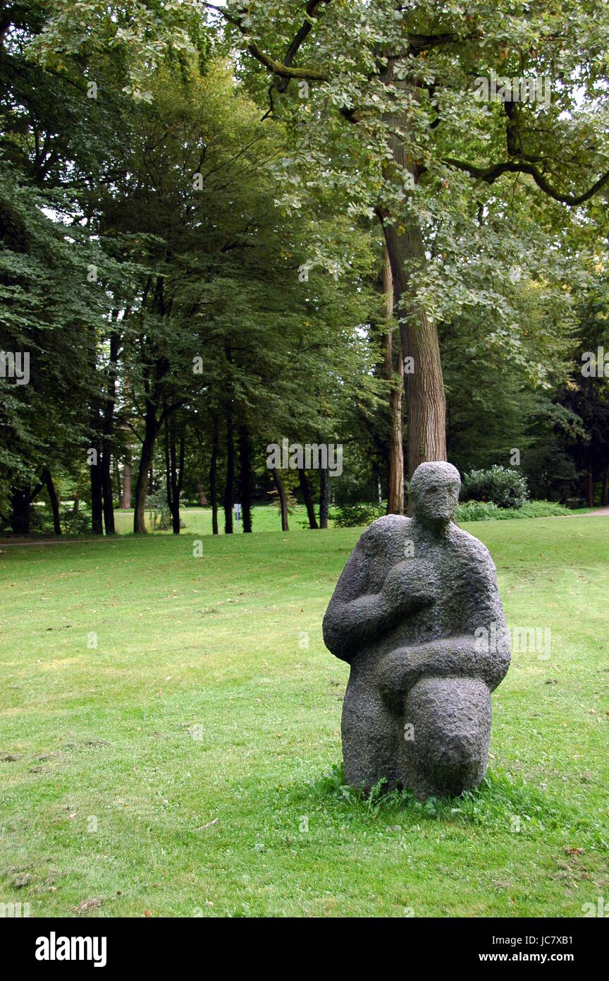 sculpture urmensch in city park wörth am rhein Stock Photo