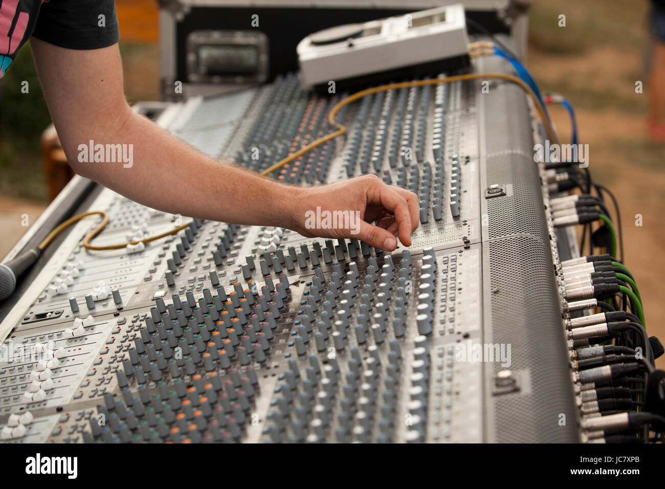 hand over music mixer Stock Photo