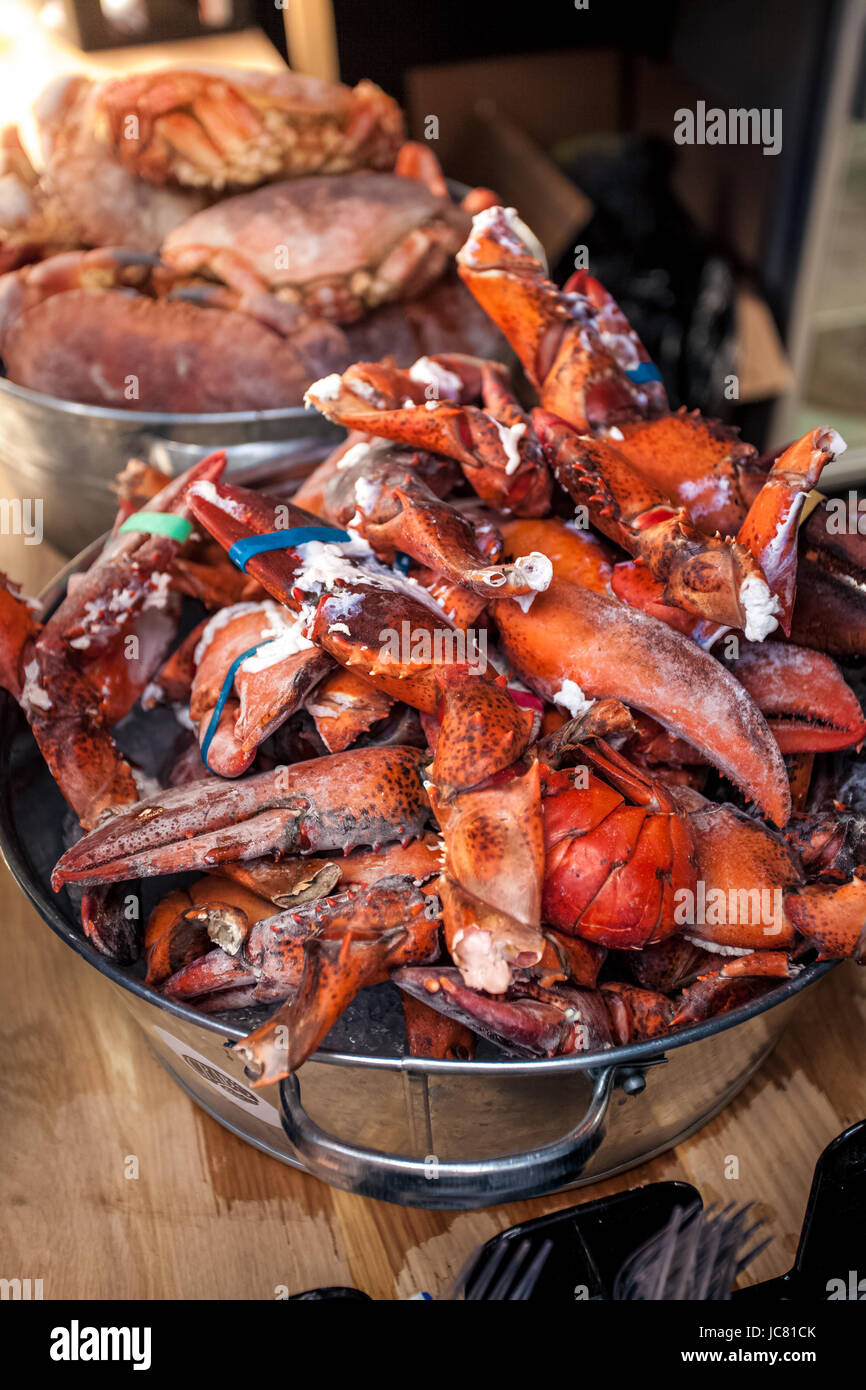 Frozen lobster claws at metal bucket at kitchen Stock Photo Alamy