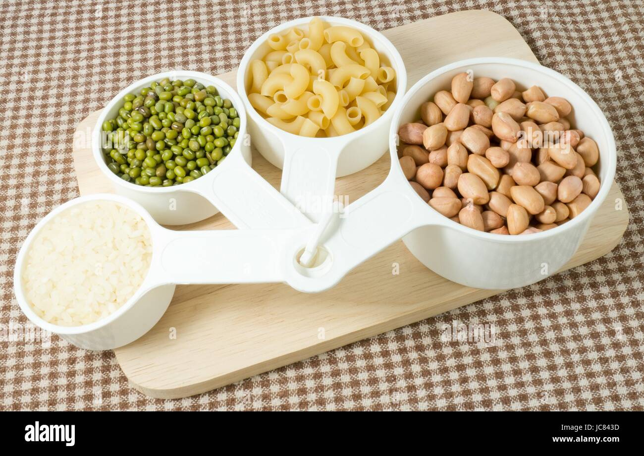 Foods High in Carbohydrate, Raw Pasta, Rice, Peanuts and Mung Beans in