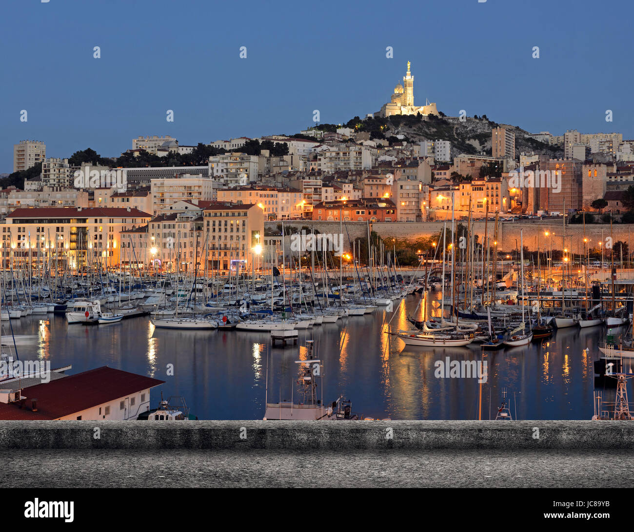 Marseille cityscape with famous landmark Notre Dame de la Garde church ...