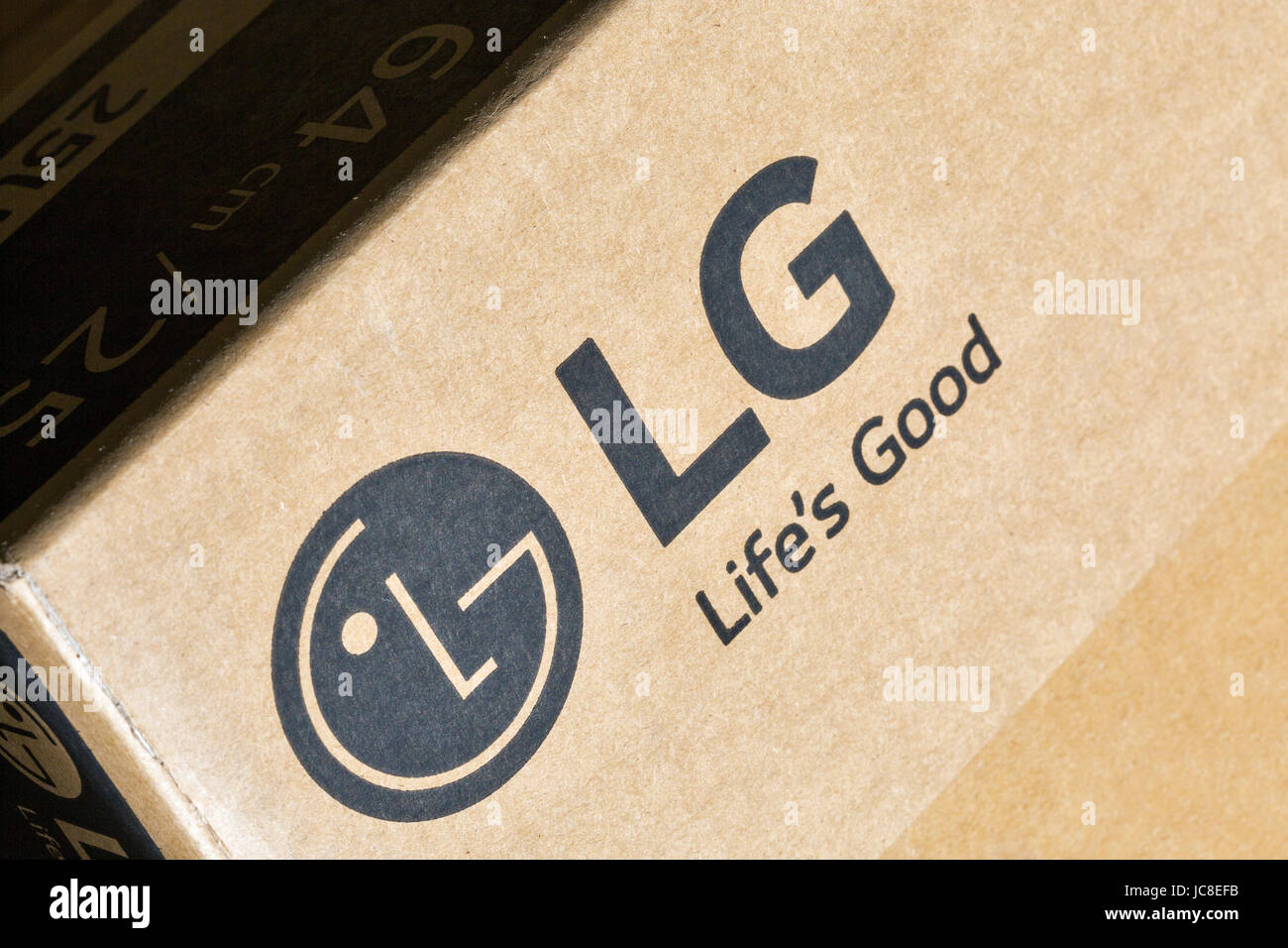 KIEV, UKRAINE - APRIL 27, 2017: LG company logo on display carton box closeup. LG is a South Korean multinational conglomerate corporation. Stock Photo