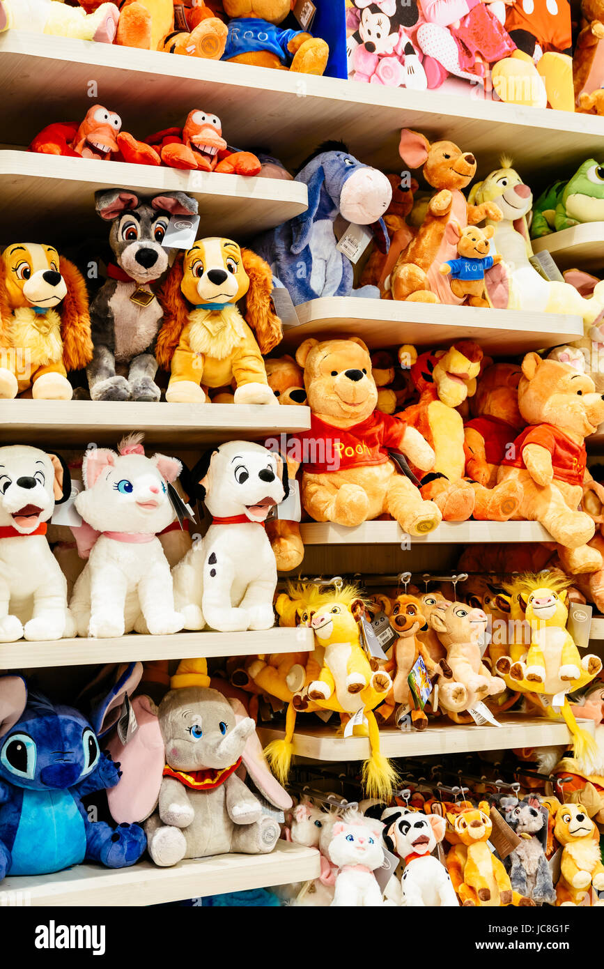 BARCELONA, SPAIN - AUGUST 05, 2016: Plush Toys For Kids At Sale In Disney Store. Stock Photo
