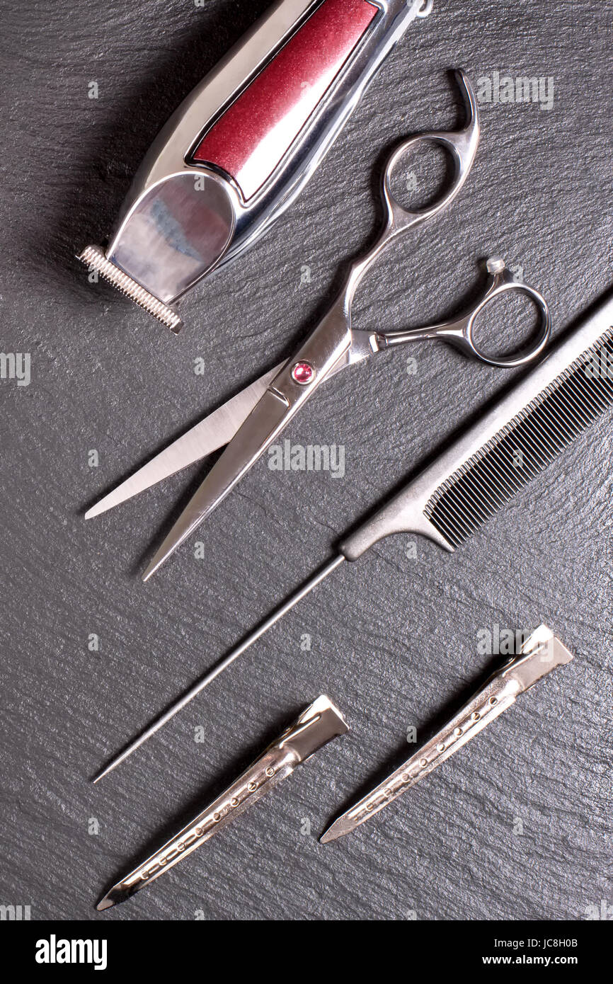 Stylish Professional tool, Hair Cutting on black background