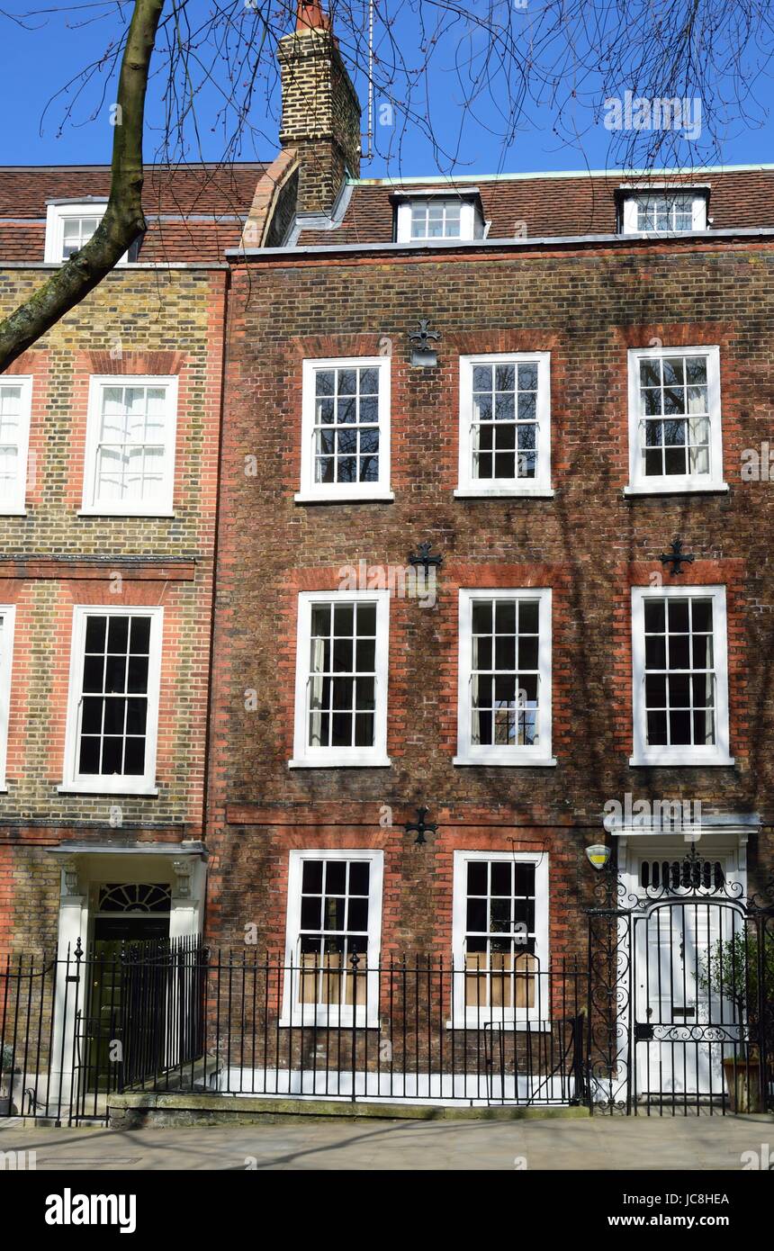 A Row of Brick Buildings with Black Doors on a Street in London Stock Image  - Image of architecture, english: 189002149