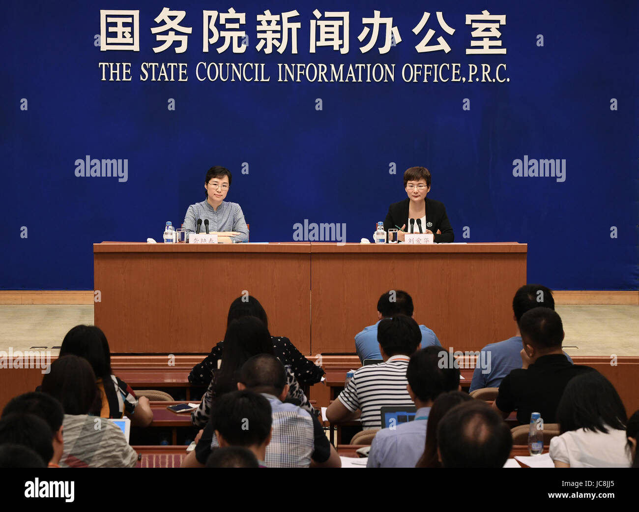 Beijing, China. 14th June, 2017. Liu Aihua (R), spokeswoman of the ...