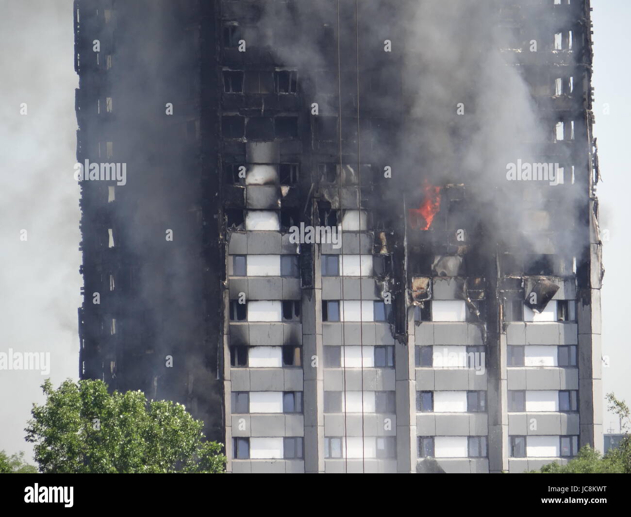 London, UK. 14th June, 2017. Fire fighters are trying to stop he fire in West London where the Grenfell Tower was blazing over night, meannwhile the North Kensington stuck in traffic as some of the roads were closed due to the probability of building's collapse, London, UK. Credit: Nastia M/Alamy Live News Stock Photo