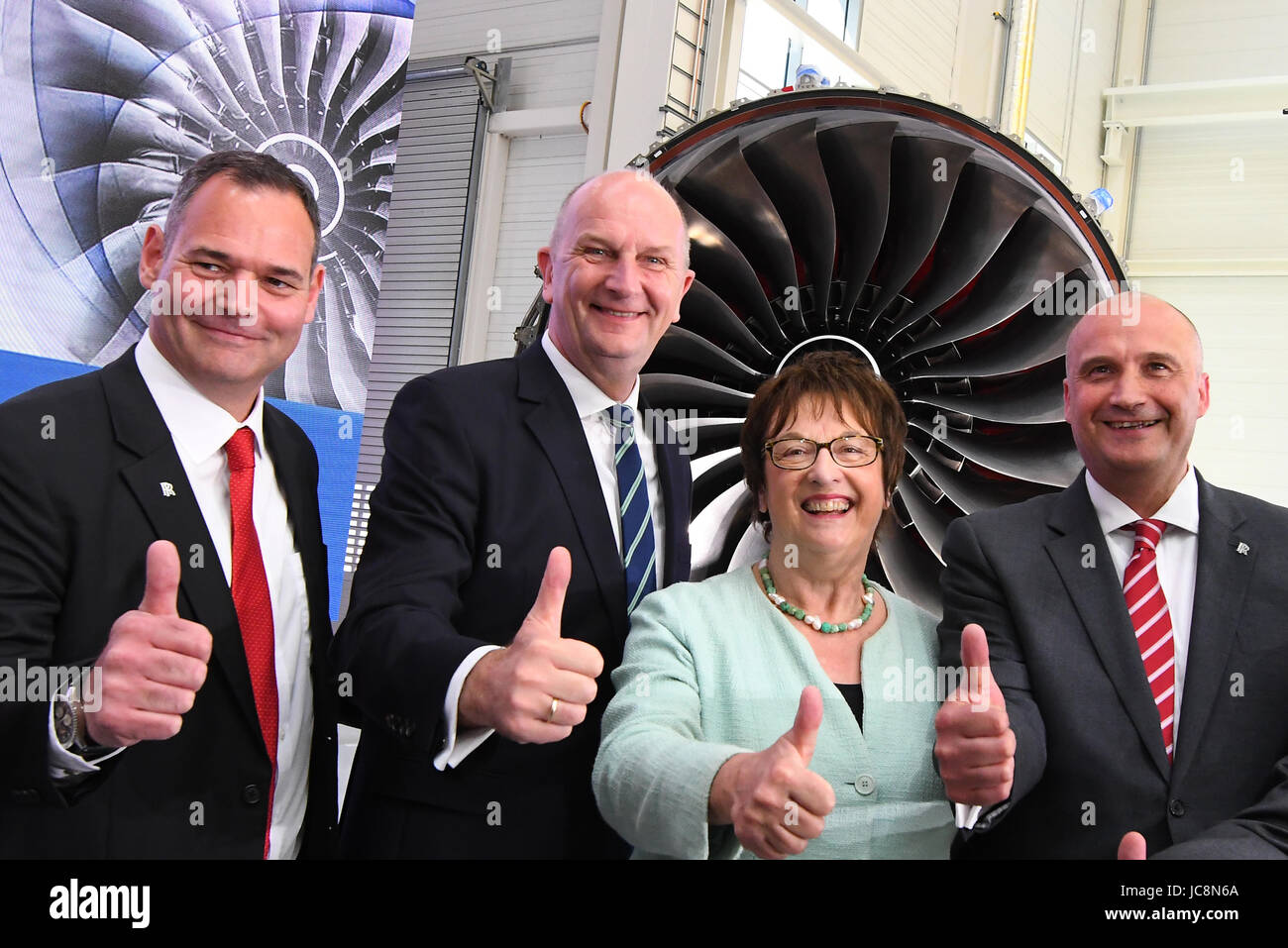 Dahlewitz, Germany. 14th June, 2017. Paul O'Neil (L-R), Rolls Royce  Executive Vice President, Brandenburg's prime minister Dietmar Woidke,  federal minister of economy Brigitte Zypries and Rolls Royce President of  Civil Aerospace Eric