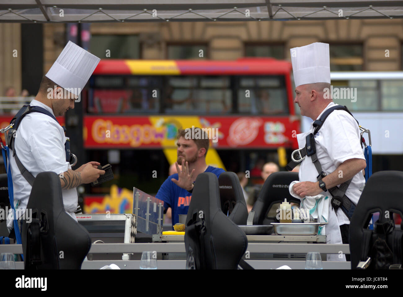 Glasgow, Scotland, UK. 14th June. The 'flying restaurant' was set up today in George Square by  the  Events in the Sky company. Glaswegians will be able to eat pie in the sky, as the city’s  top restaurants are serving meals  to patrons suspended high above the city for the next week .Credit Gerard Ferry/Alamy Live News Stock Photo