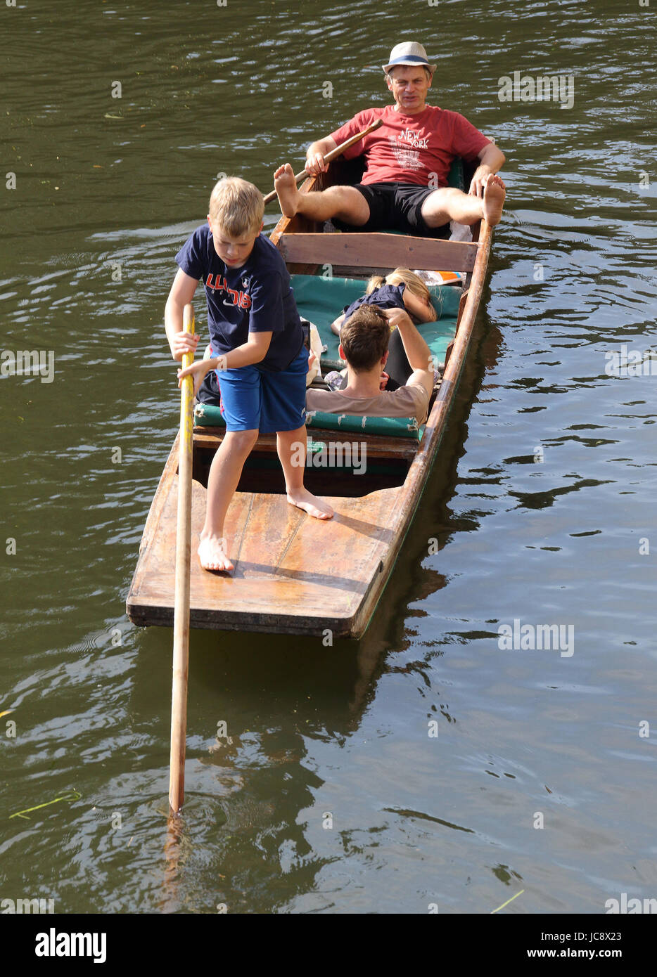 Cambridge, UK. 14th June, 2017. Cambridge, UK - People enjoy a warm summer evening punting on the River Cam through Cambridge, on Wednesday June 14th 2017 Credit: KEITH MAYHEW/Alamy Live News Stock Photo
