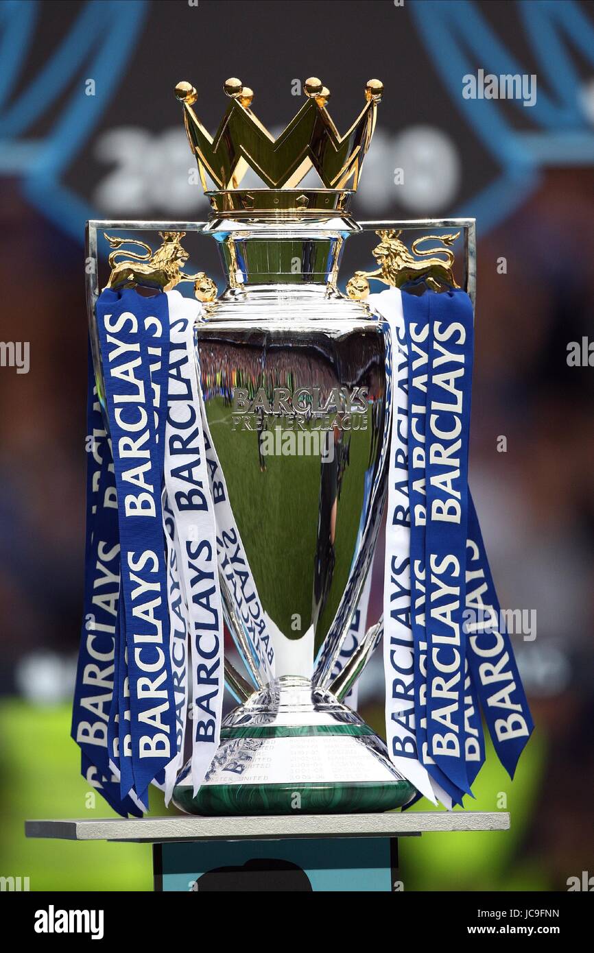 Celebrates with the barclays premier league trophy hi-res stock photography  and images - Alamy