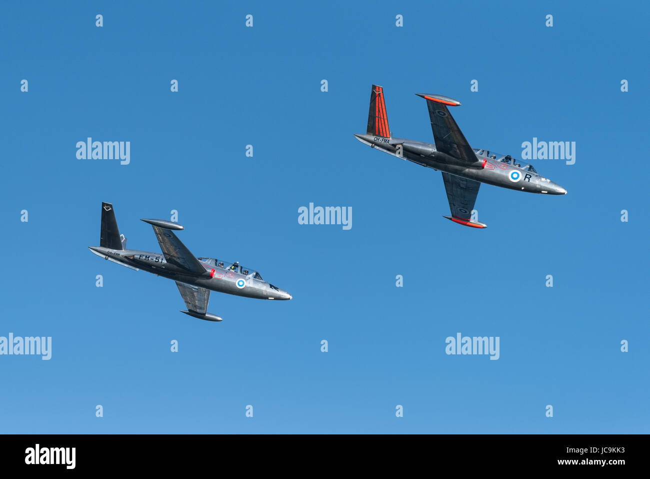Helsinki, Finland - 9 June 2017: Two Silver Jets Aerobatic Team Fouga CM 170 Magister jets flying at the Kaivopuisto Air Show in Helsinki, Finland. Stock Photo