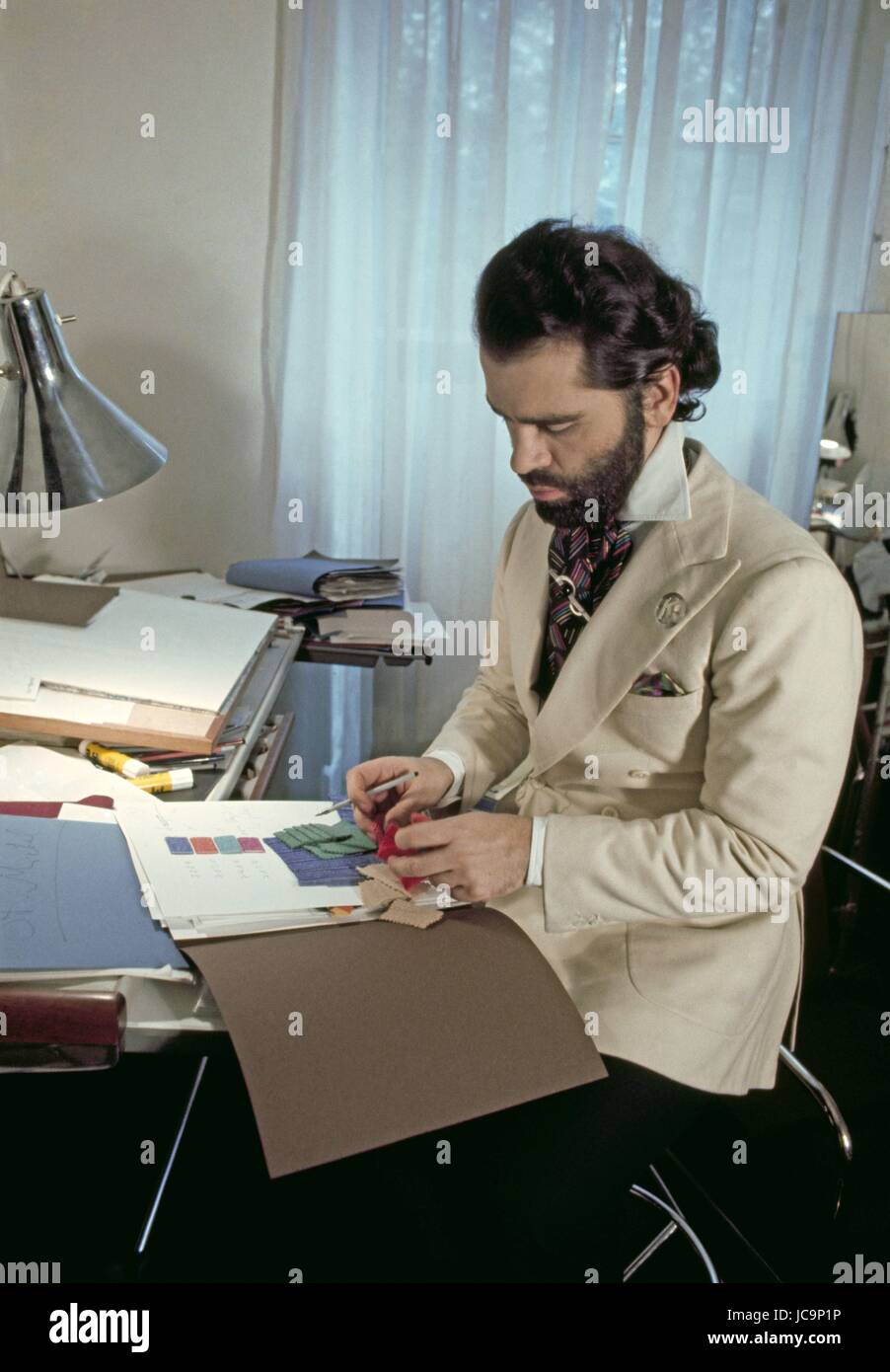 German fashion designer Karl Lagerfeld posing in his appartment located