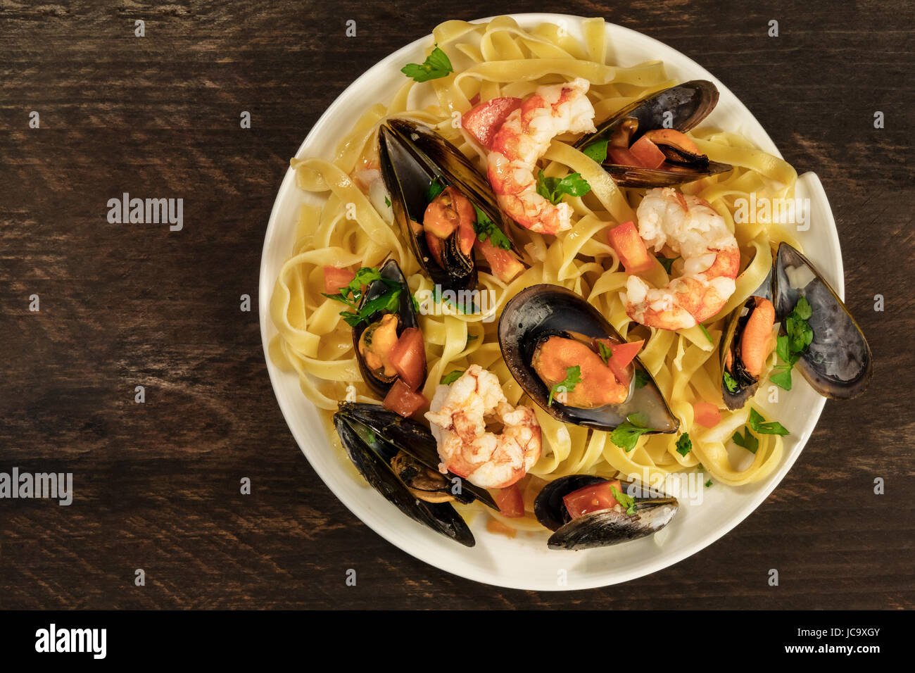Seafood pasta dish with mussels and shrimps Stock Photo Alamy