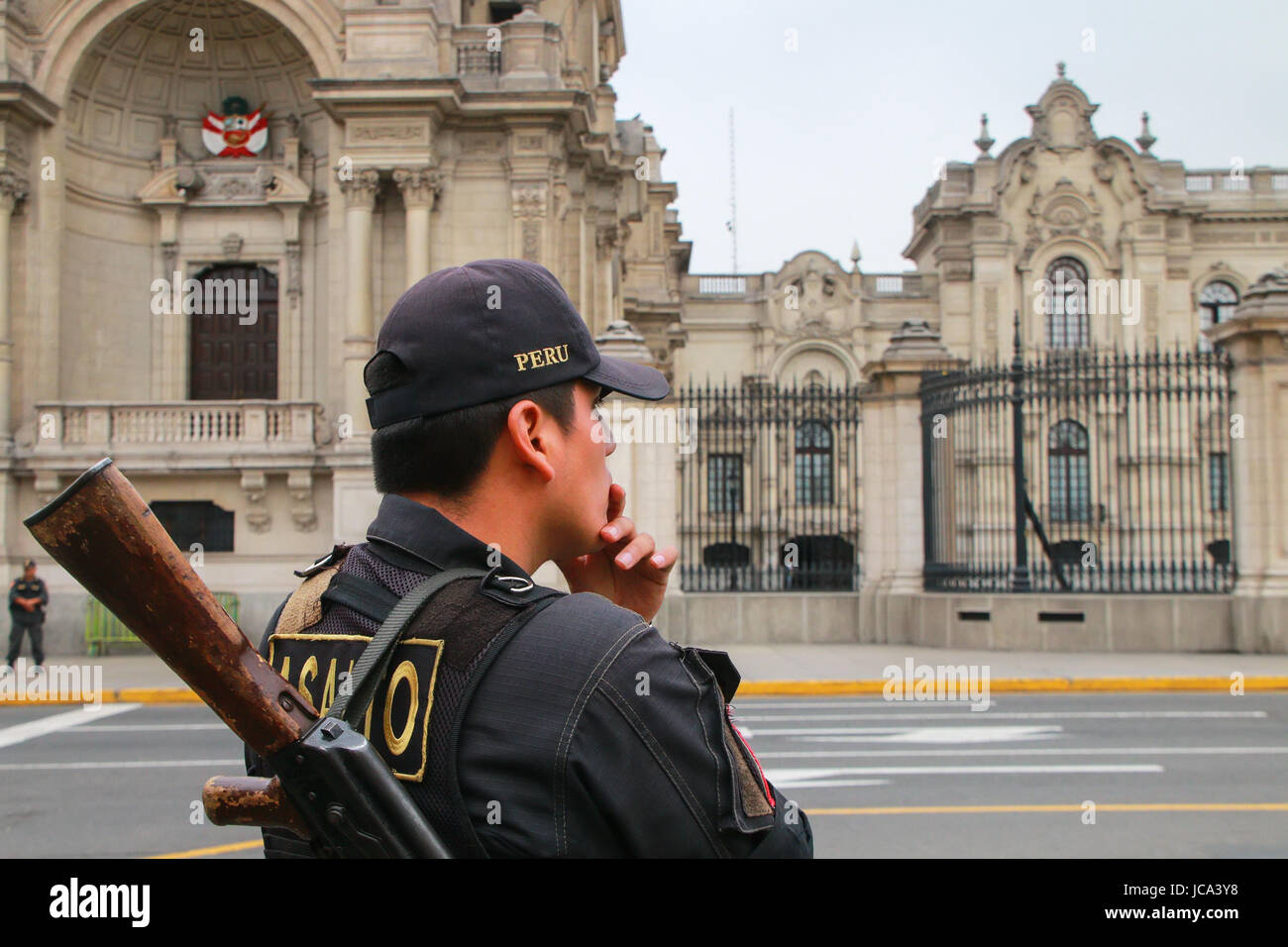 Policeman standing near Government Palace in Lima, Peru. Peruvian National Police is one of the largest police forces in South America. Stock Photo