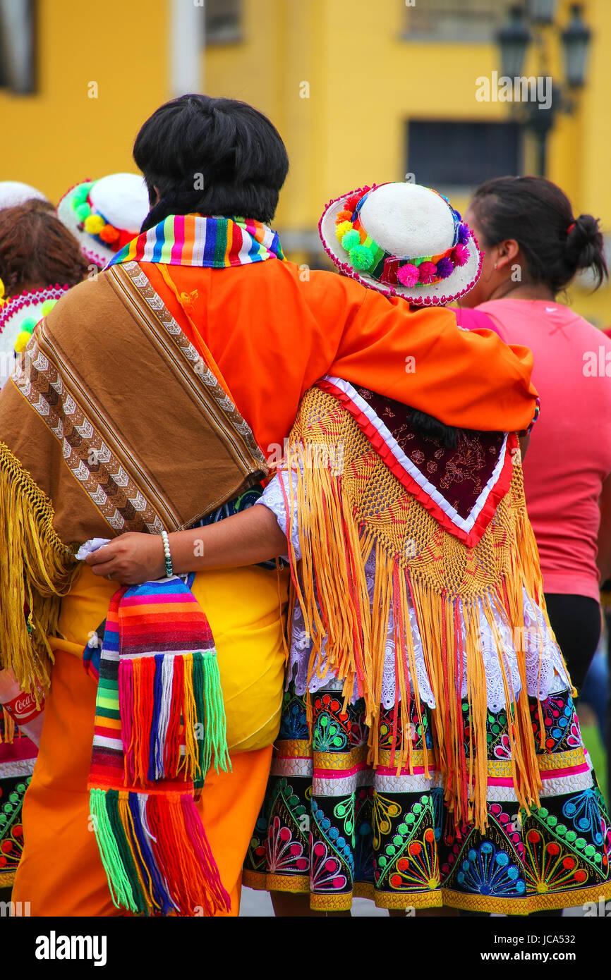 Couple standing during Festival of the Virgin de la Candelaria in Lima, Peru. The core of the festival is dancing and music performed by different dan Stock Photo